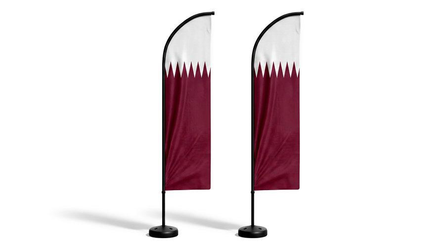 Two Qatar feather flags on weighted bases.