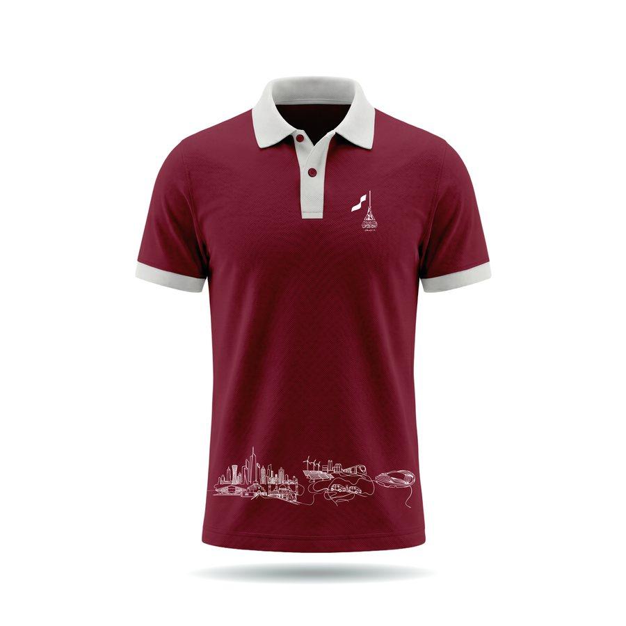 The maroon National Day polo with a white collar and skyline line art at the hem.