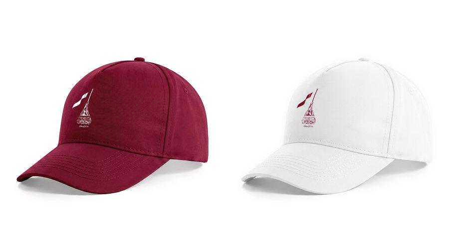 National Day caps in maroon and white with front embroidery.