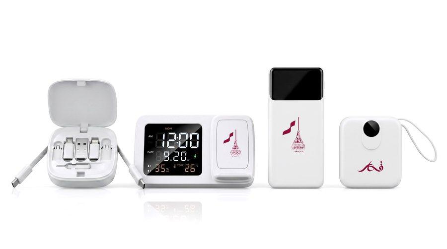 A cable set, desk clock, power bank and tracker, each carrying the National Day mark.