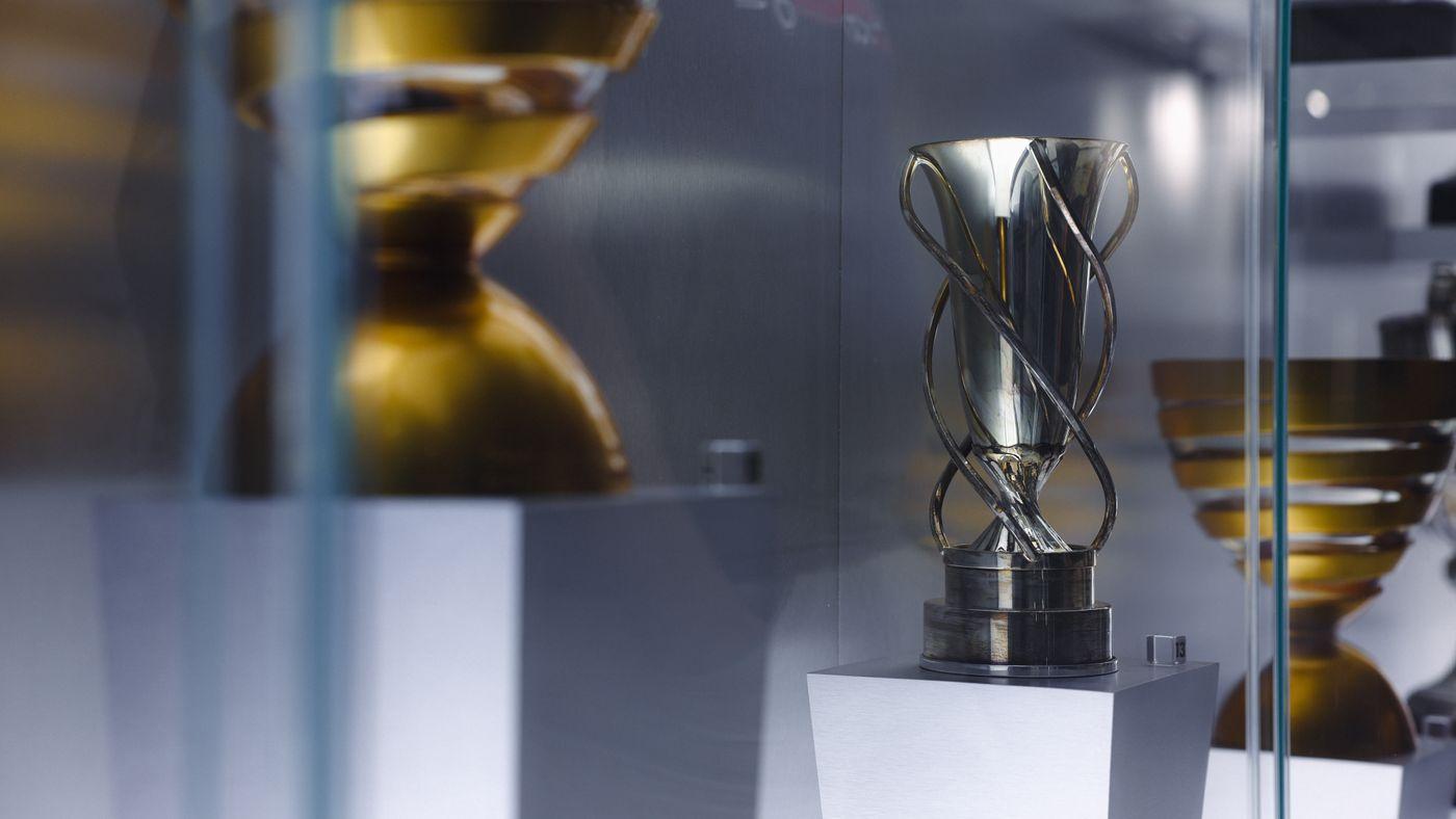 Polished crystal and metal corporate award on display