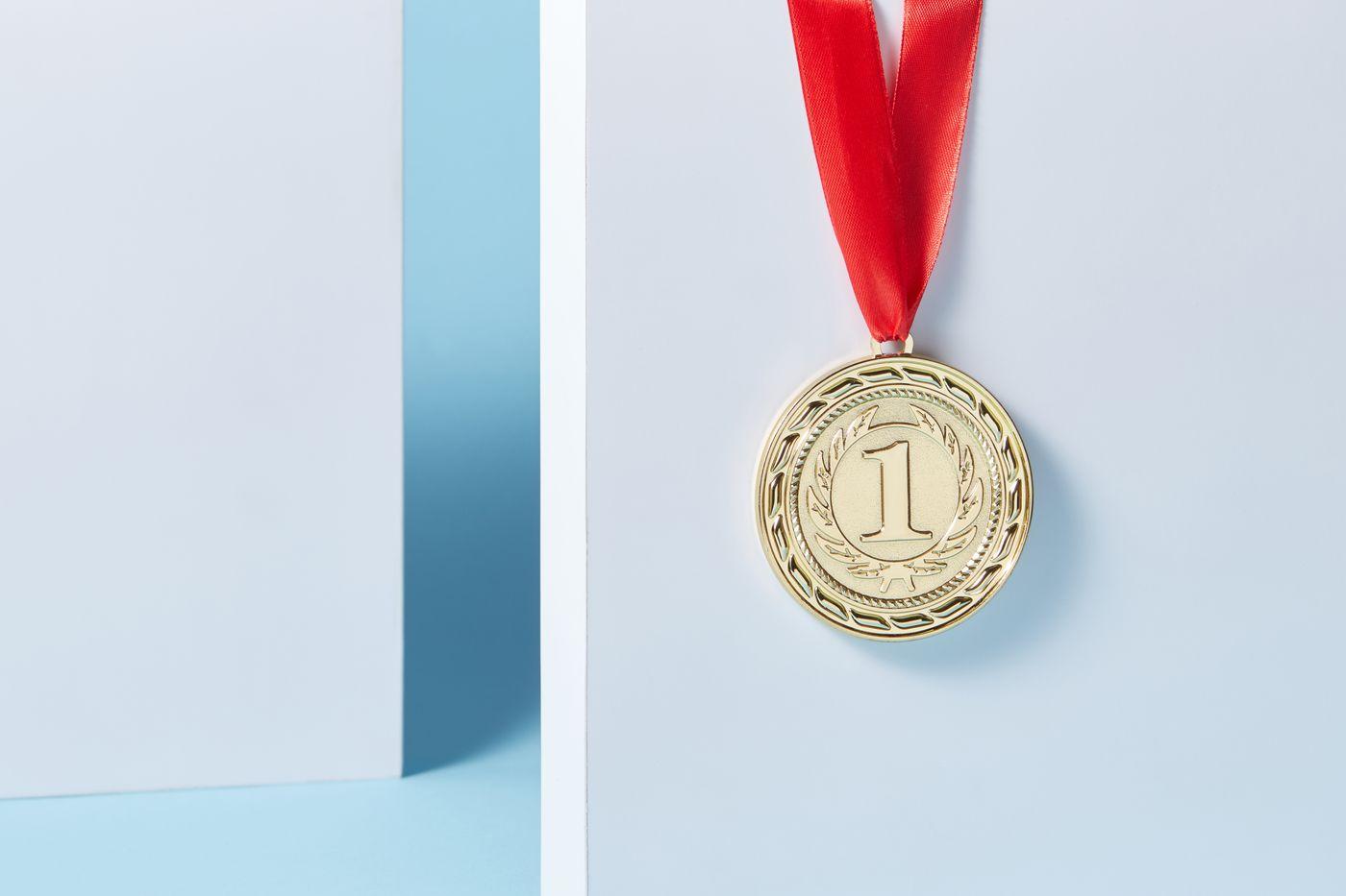 Gold first-place medal on a ribbon